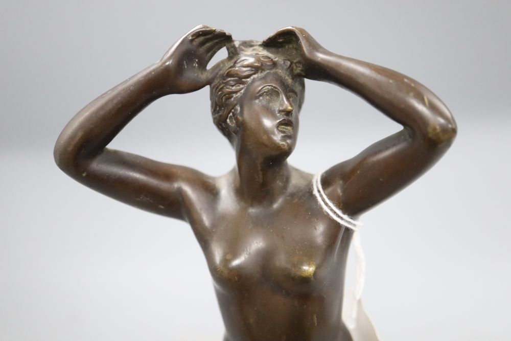 After the antique. A bronze figure of Aphrodite, signed Cartinet, overall height 30.5cm